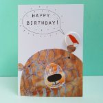 birthday card with badge and bear by the black rabbit