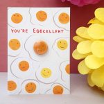 Egg greeting card with pin badge by the black rabbit