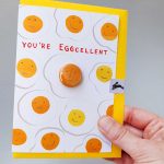 Egg greeting card with pin badge by the black rabbit