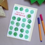 christmas greeting card with sprout pin badge