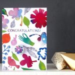 congratulations badge card with flower by the black rabbit