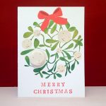 Mistletoe merry christmas card with pin badge by the black rabbit