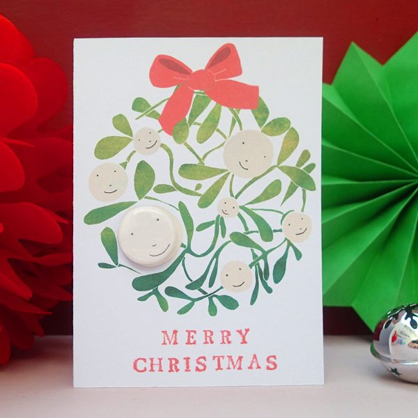 Mistletoe merry christmas card with pin badge by the black rabbit