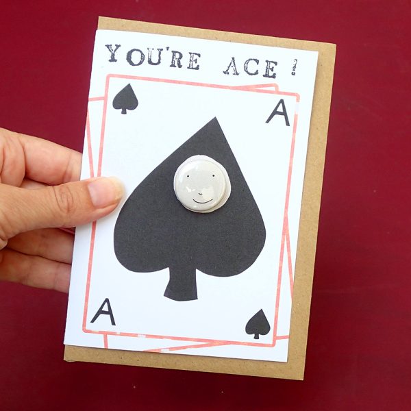 You're ace! playing card ace of spades card with a pin badge