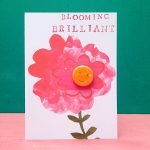 pin badge on a card with a pink flower, bloomin brilliant, by the black rabbit