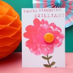 pin badge on a card with a pink flower, bloomin brilliant, by the black rabbit