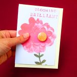 pin badge on a card with a pink flower, bloomin brilliant, by the black rabbit